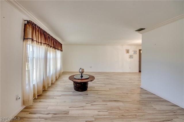 3708 SE 16th Pl, Cape Coral, FL 33904 - spare room with crown molding, light wood-style floors, and visible vents