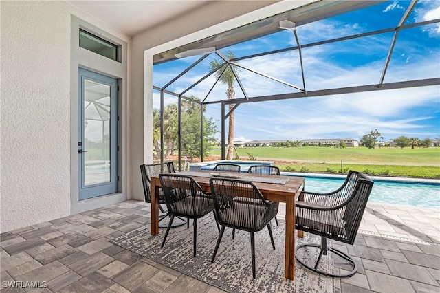 view of patio / terrace featuring an outdoor pool and a lanai