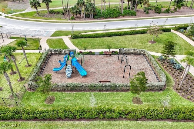 community playground featuring a yard