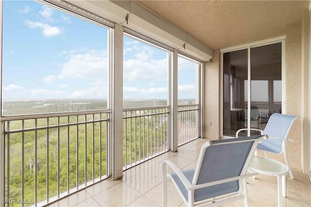 sunroom with tile patterned floors