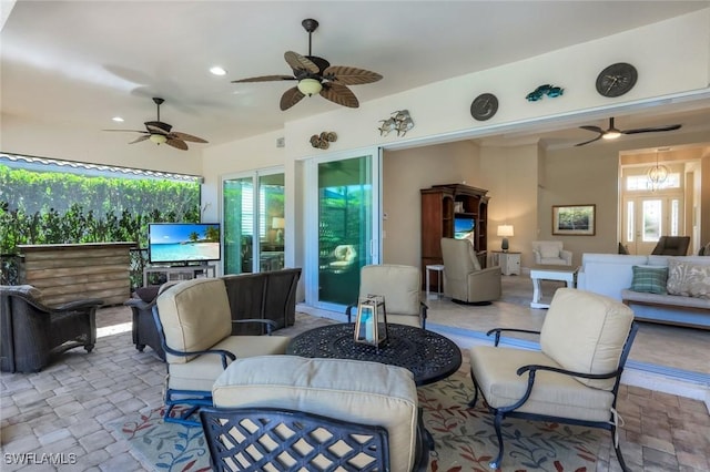 9282 Quarry Dr, Naples, FL 34120 - view of patio featuring an outdoor living space and ceiling fan