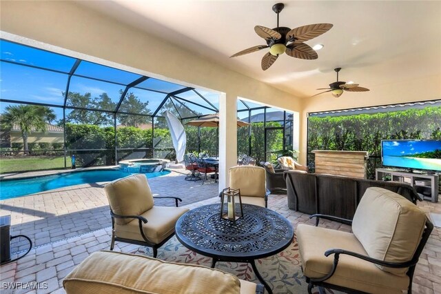 9282 Quarry Dr, Naples, FL 34120 - view of patio featuring a pool with connected hot tub, ceiling fan, glass enclosure, and an outdoor hangout area