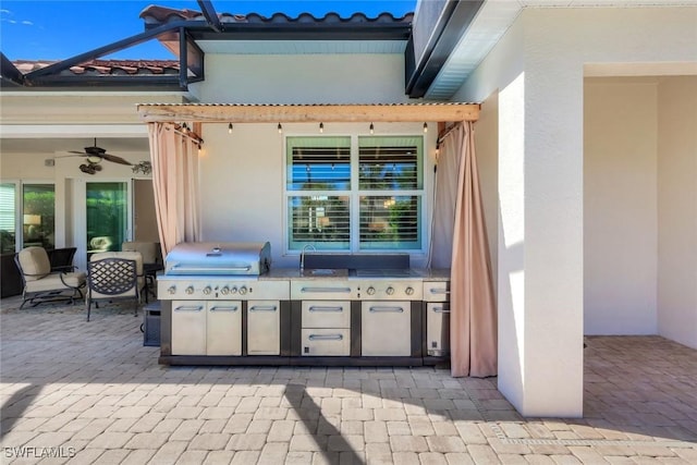 9282 Quarry Dr, Naples, FL 34120 - view of patio / terrace with a lanai, an outdoor kitchen, and ceiling fan