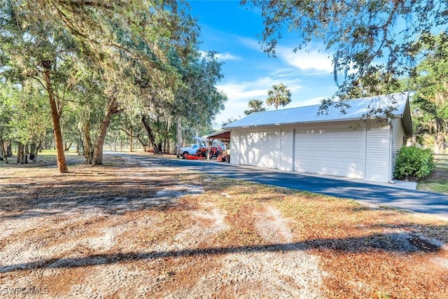 garage featuring a detached garage