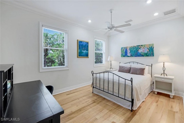 bedroom with recessed lighting, light wood-style floors, visible vents, and baseboards