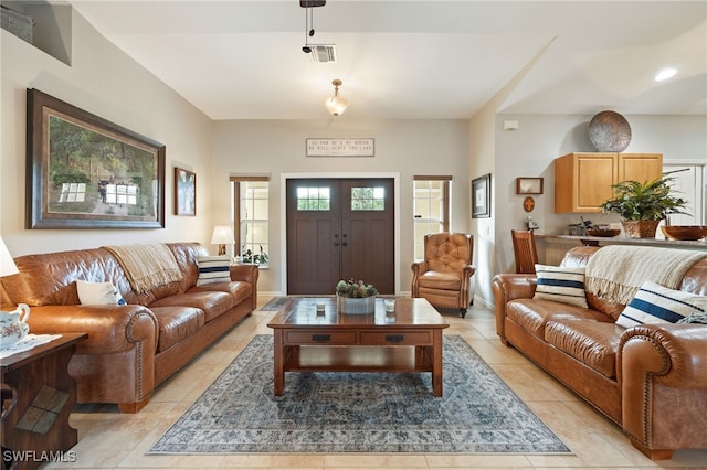 living room featuring visible vents, recessed lighting, and light tile patterned floors