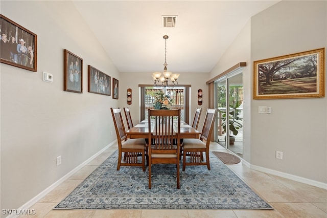 dining room with visible vents, a chandelier, baseboards, lofted ceiling, and light tile patterned floors