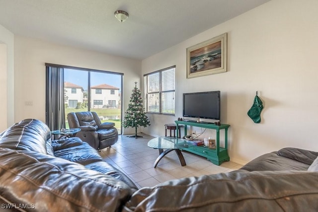 5467 Ferris Ave, Ave Maria, FL 34142 - living room featuring tile patterned floors and baseboards
