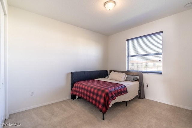 5467 Ferris Ave, Ave Maria, FL 34142 - bedroom featuring carpet and baseboards
