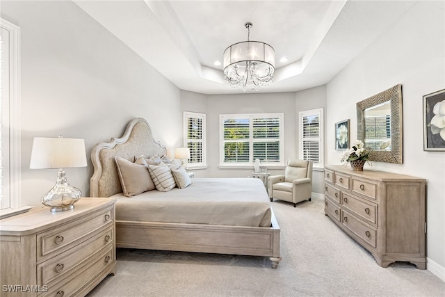 4194 Aspen Chase Dr, Naples, FL 34119 - bedroom featuring a chandelier, light carpet, a tray ceiling, and recessed lighting
