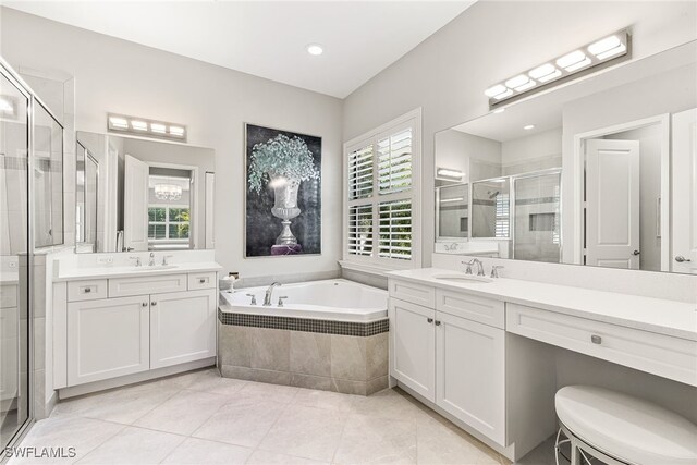 4194 Aspen Chase Dr, Naples, FL 34119 - bathroom with a shower stall, two vanities, a garden tub, tile patterned floors, and recessed lighting