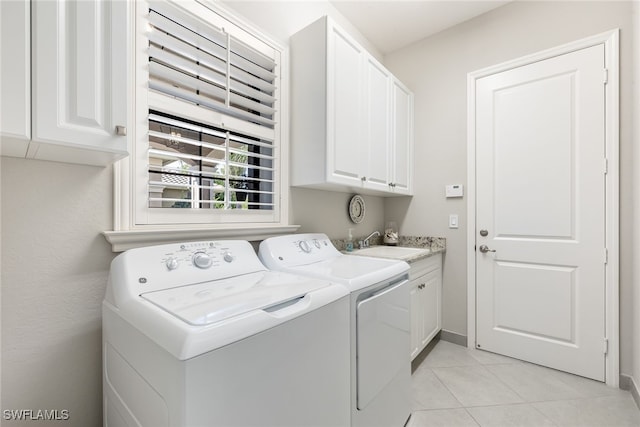 4194 Aspen Chase Dr, Naples, FL 34119 - laundry room with cabinet space, separate washer and dryer, and light tile patterned floors