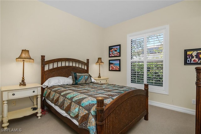 3370 Oaklake Ct, Bonita Springs, FL 34134 - carpeted bedroom featuring baseboards