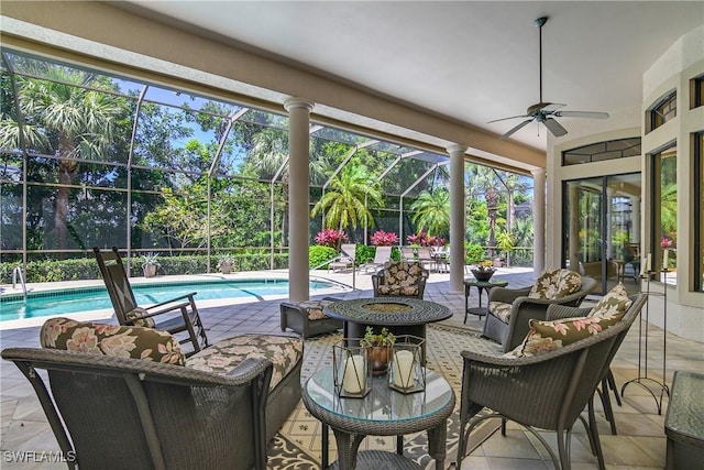 3370 Oaklake Ct, Bonita Springs, FL 34134 - exterior space with an outdoor pool, an outdoor living space with a fire pit, and glass enclosure