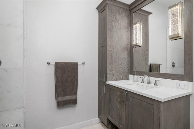 3370 Oaklake Ct, Bonita Springs, FL 34134 - bathroom featuring vanity and baseboards