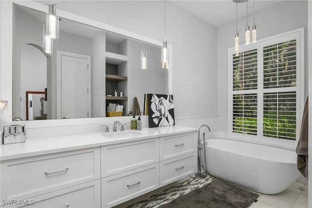 3370 Oaklake Ct, Bonita Springs, FL 34134 - full bath with a soaking tub and vanity