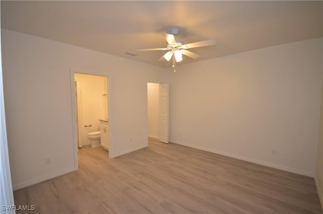 3341 Willard St, Fort Myers, FL 33916 - unfurnished bedroom with baseboards, visible vents, light wood-style flooring, and ensuite bath