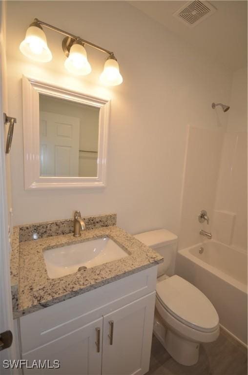 3341 Willard St, Fort Myers, FL 33916 - full bath featuring visible vents, toilet, vanity, and shower / tub combination