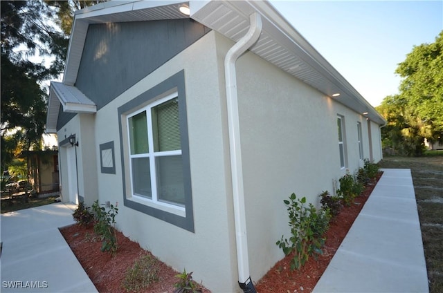 3341 Willard St, Fort Myers, FL 33916 - view of side of property featuring stucco siding