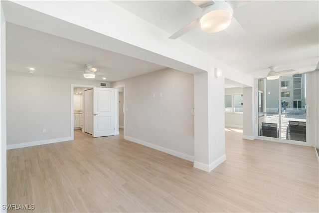 25900 Hickory Blvd Unit 101, Bonita Springs, FL 34134 - unfurnished room with light wood-style flooring, baseboards, and ceiling fan