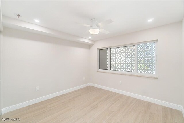 25900 Hickory Blvd Unit 101, Bonita Springs, FL 34134 - spare room featuring baseboards, a ceiling fan, light wood-style floors, and recessed lighting