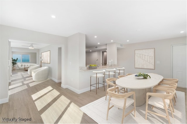 25900 Hickory Blvd Unit 101, Bonita Springs, FL 34134 - dining room with light wood-type flooring, baseboards, and recessed lighting