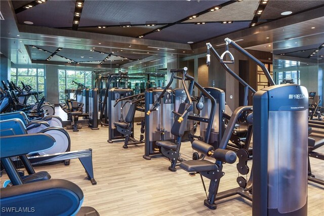 6897 Grenadier Blvd Unit 1602, Naples, FL 34108 - gym featuring wood finished floors