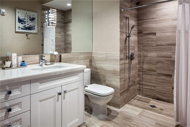 6897 Grenadier Blvd Unit 1602, Naples, FL 34108 - full bath featuring tiled shower, tile walls, and toilet