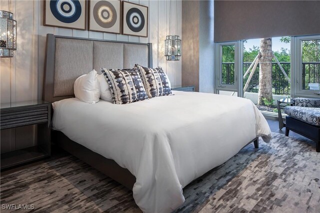 6897 Grenadier Blvd Unit 1602, Naples, FL 34108 - bedroom with wood finished floors
