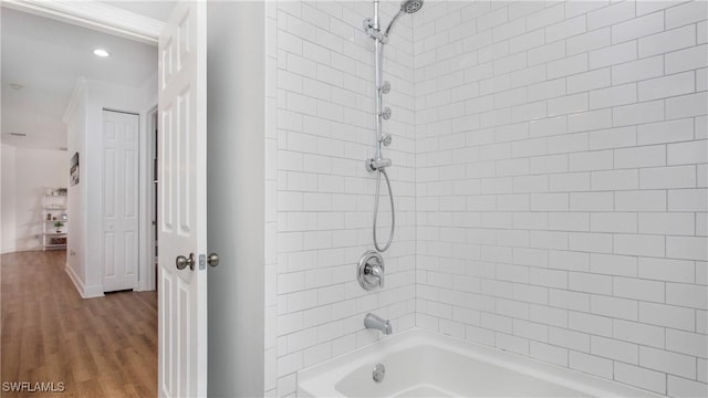 1824 SE 20th Ln, Cape Coral, FL 33990 - full bath with  shower combination, recessed lighting, and wood finished floors