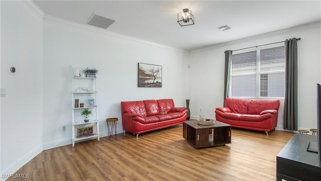 1824 SE 20th Ln, Cape Coral, FL 33990 - living room with crown molding, baseboards, visible vents, and light wood-style floors