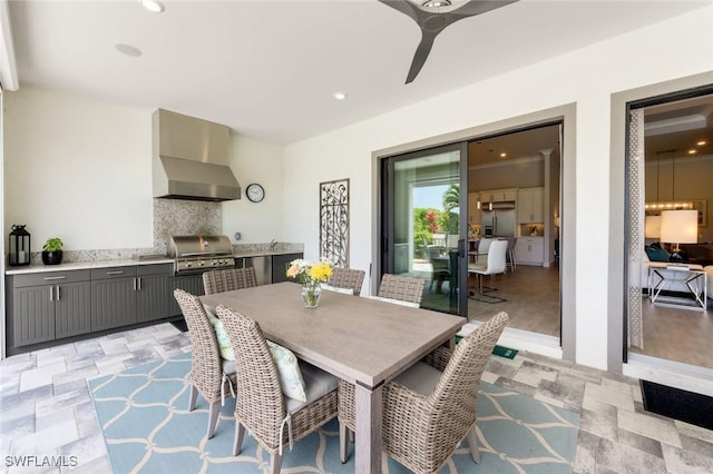 dining space featuring a ceiling fan and recessed lighting