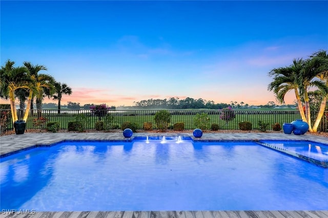 view of swimming pool with a fenced in pool and a fenced backyard