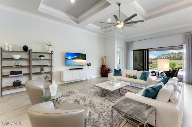 living room with coffered ceiling, a ceiling fan, beam ceiling, baseboards, and light wood-style flooring