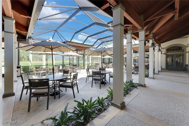 view of patio / terrace with a lanai and french doors