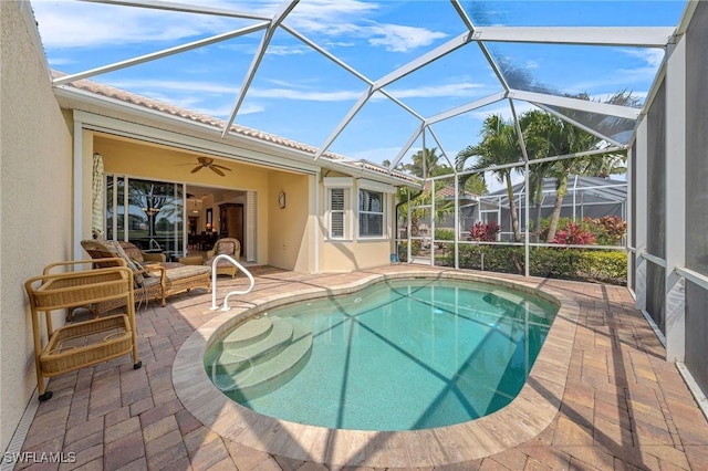 6683 Castlelawn Pl, Naples, FL 34113 - outdoor pool with a patio area, ceiling fan, and glass enclosure