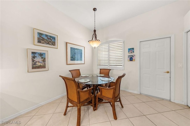 6683 Castlelawn Pl, Naples, FL 34113 - dining room featuring light tile patterned floors and baseboards