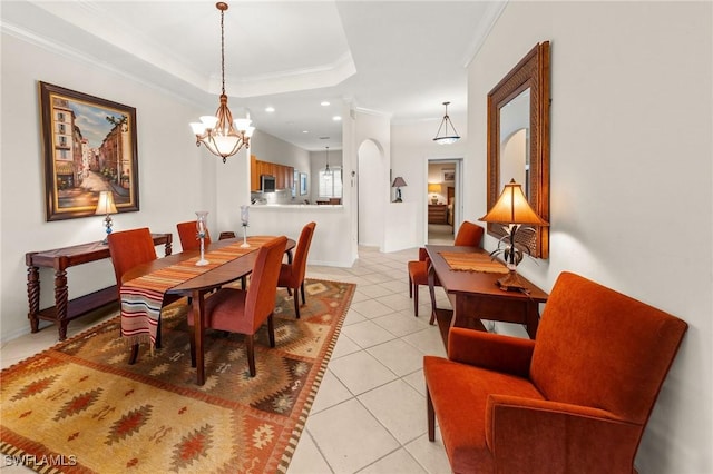 6683 Castlelawn Pl, Naples, FL 34113 - dining space with light tile patterned floors, a raised ceiling, ornamental molding, a chandelier, and recessed lighting