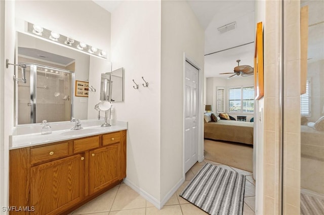 6683 Castlelawn Pl, Naples, FL 34113 - ensuite bathroom featuring ensuite bathroom, ceiling fan, visible vents, a stall shower, and tile patterned floors