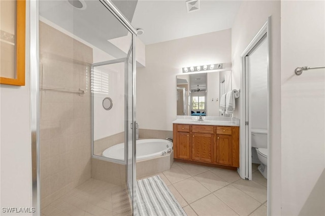 6683 Castlelawn Pl, Naples, FL 34113 - full bath featuring vanity, a stall shower, tile patterned flooring, toilet, and visible vents