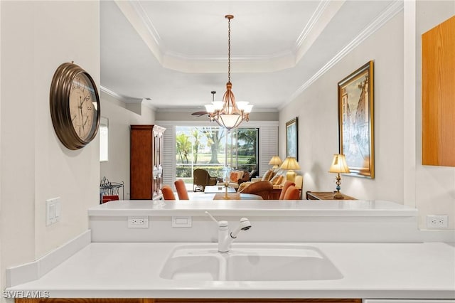 6683 Castlelawn Pl, Naples, FL 34113 - ensuite bathroom with vanity, a tray ceiling, an inviting chandelier, and ornamental molding