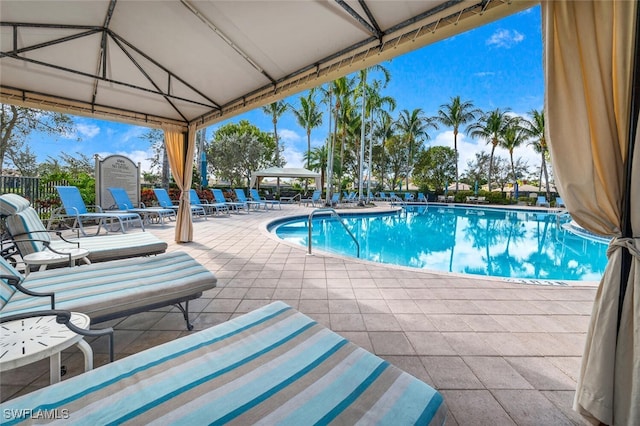 6532 Monterey Pt Unit 202, Naples, FL 34105 - community pool featuring a gazebo and a patio area