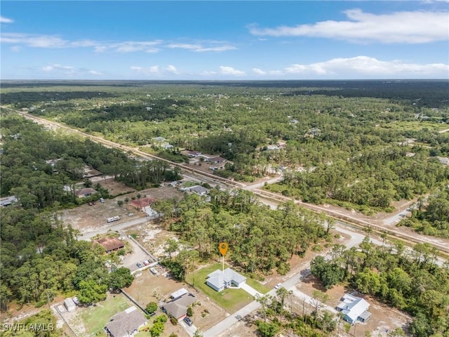 1606 Euclid Ave, Lehigh Acres, FL 33972 - drone / aerial view of a heavily wooded area