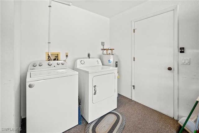 washroom with laundry area, separate washer and dryer, and carpet