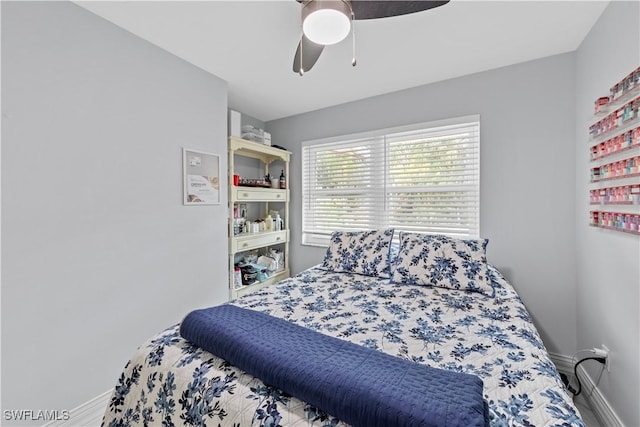 3586 Croton Rd, Naples, FL 34104 - bedroom featuring a ceiling fan and baseboards