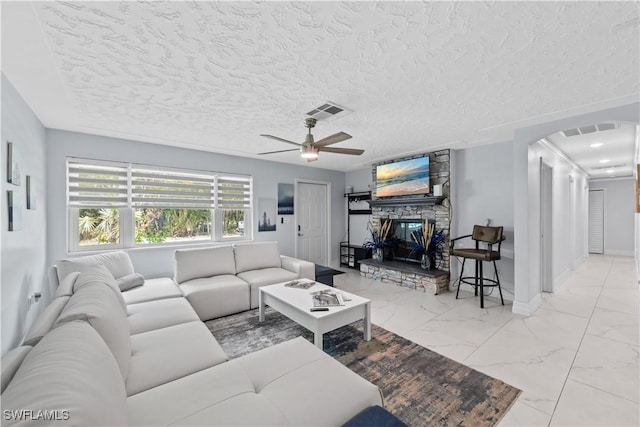 3586 Croton Rd, Naples, FL 34104 - living area featuring marble finish floor, visible vents, arched walkways, and a ceiling fan