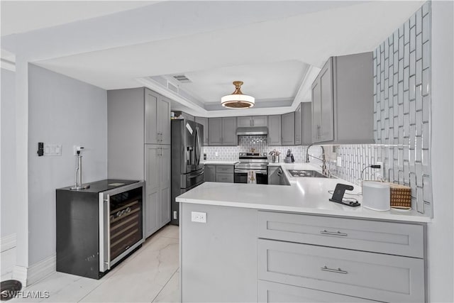 3586 Croton Rd, Naples, FL 34104 - kitchen featuring marble finish floor, tasteful backsplash, electric stove, a sink, and gray cabinets