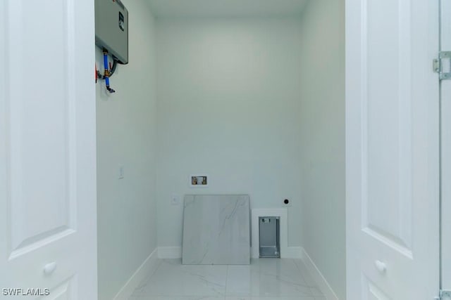 laundry room featuring baseboards, marble finish floor, laundry area, and washer hookup