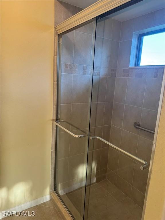 4628 SW 18th Ave, Cape Coral, FL 33914 - bathroom featuring a shower stall and tile patterned floors