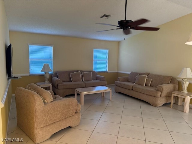 4628 SW 18th Ave, Cape Coral, FL 33914 - living room with light tile patterned flooring, visible vents, and a ceiling fan